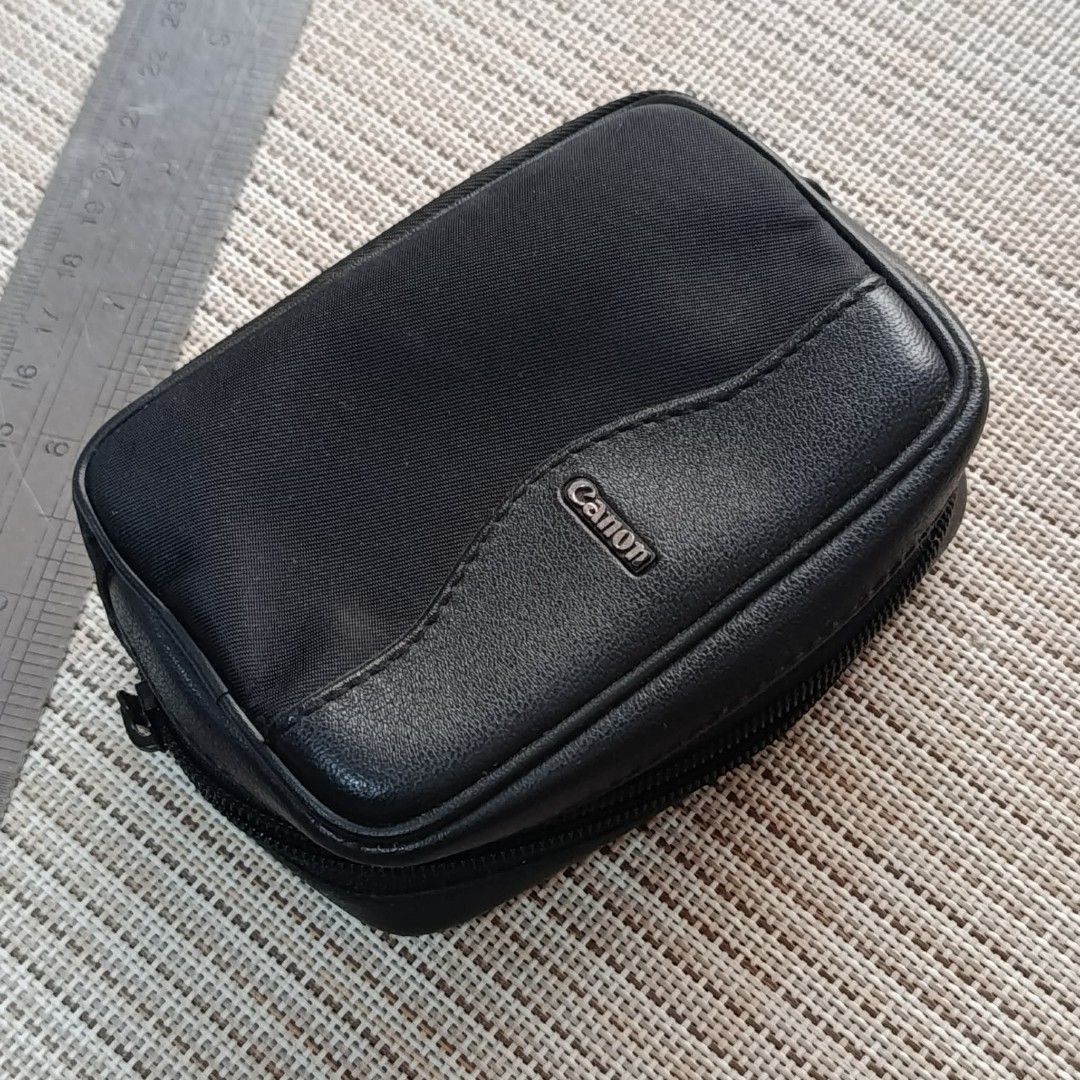 Canon Original Leather Camera Case (Category: Camera Bags & Carriers) located in Las Pinas. Submitted by 84vintage (Listing ID 1470197534, Image 2). Description: Canon original leather camera case for small cameras. With a small "secret pouch" inside for memory cards, a small battery, or a remote control. Actual photos posted. Please examine them carefully as they are part of the description. --📌 MUST READ Before Dealing with us 📌-- ⚠️Price is 
