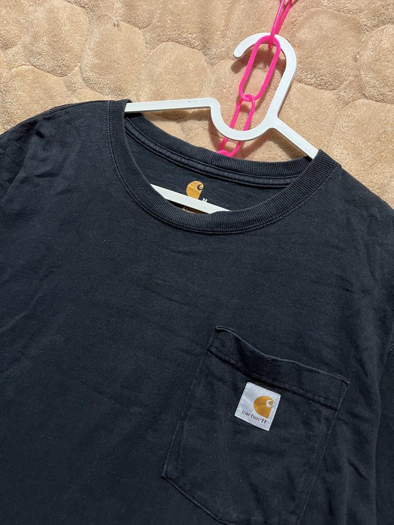 Carhartt pocket tee (Category: Activewear) located in Cebu City. Submitted by thrift.sht (Listing ID 1470315754, Image 2). Description: CARHARTT POCKET TEE BLACK Size: medium on tag - Oversized fit 20x29 Color: Black 9/10 Condition No issue For only ₱800! DM to mine! Ship via J&T #thriftsht #thrifting.