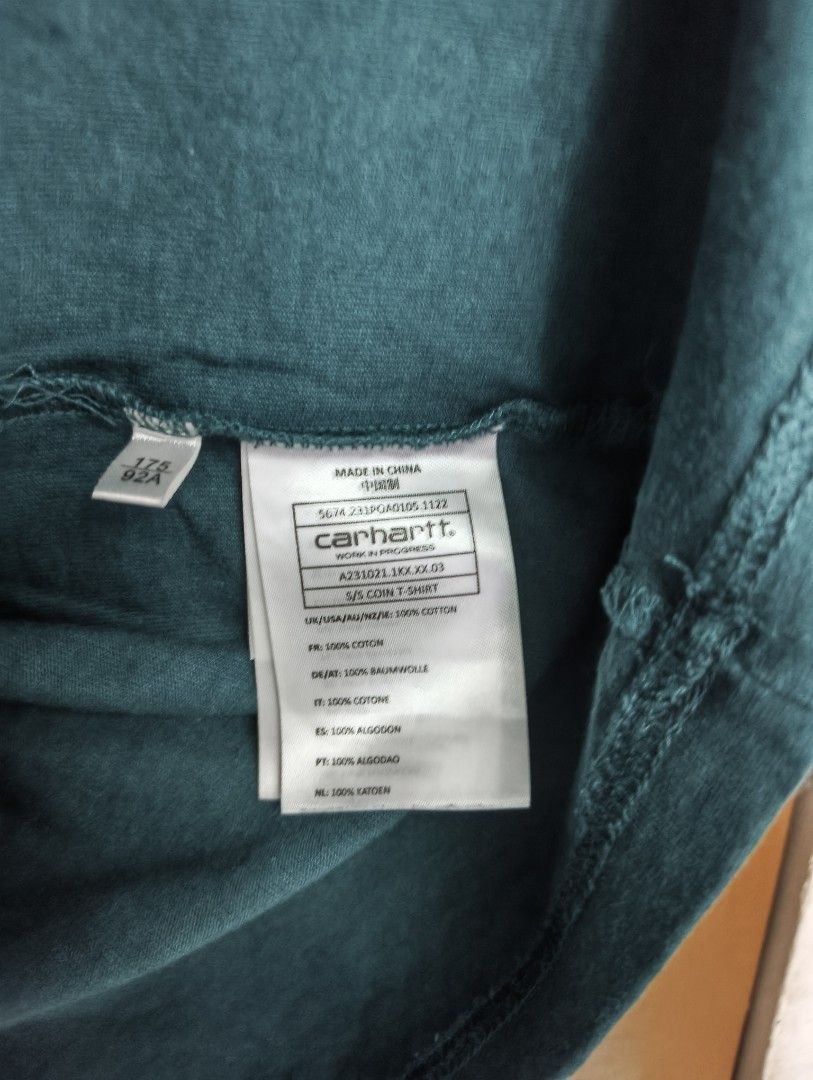 Carhartt WIP Coin Shirt (Category: Tshirts & Polo Shirts ) located in San Pedro. Submitted by madvillainkicks (Listing ID 1470153389, Image 3). Description: Carhartt WIP graphic tee in dark teal green, size medium. Features a collegiate logo and 100% cotton build. DM to order! 24 x 28.