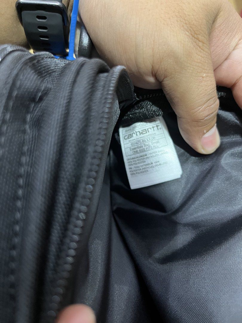 Carhartt WIP Essentials Bag Small Black (Category: Sling Bags) located in Tabuk. Submitted by collectors_thrift_shop (Listing ID 1470262344, Image 3). Description: - Brand: Carhartt WIP - Style: Essentials Bag / Crossbody - Color: Black - Condition: Brand new with original store tags attached - Material: 100% recycled polyester outer shell - Features: Multiple zippered compartments, front flap pocket, and water-repellent treatment (100% PFC free)