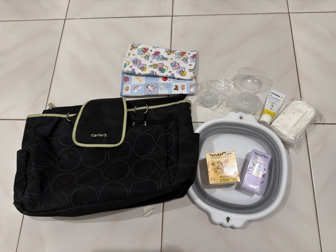 Carter's diaper bag with baby care bundle (Category: Diaper Bags & Wetbags) located in Manila. Submitted by jjaba (Listing ID 1470336400, Image 1). Description: need wash sold as set.