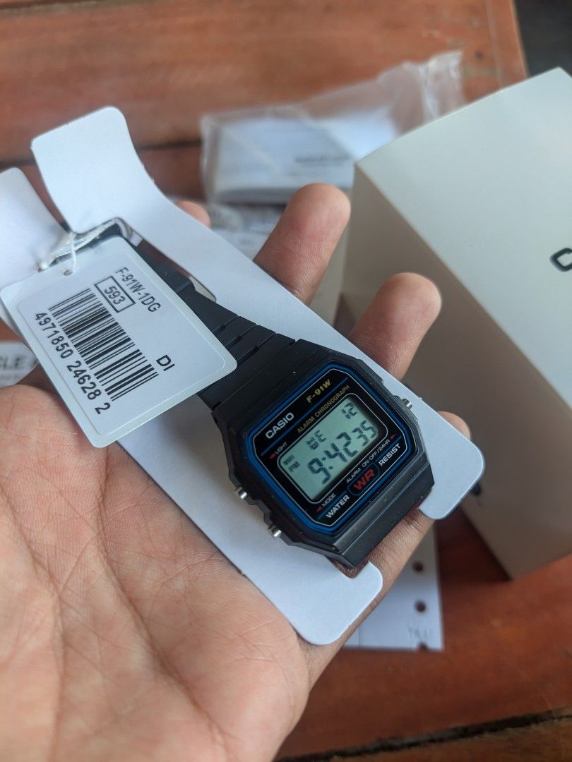 CASIO F-91W-1DG (Category: Luxury Watches) located in Balayan. Submitted by kharloevangelista (Listing ID 1470148719, Image 2). Description: Location: Balayan, Batangas Case and bezel material: Resin Band: Resin Band Water Resistant Approx. battery life: 7 years on CR2016 Features: * Stopwatch * Alarm/hourly time signal * Daily alarm * Hourly time signal * LED light * Auto-calendar (set at 28 days for February) * Accuracy: ±30 seconds per month *
