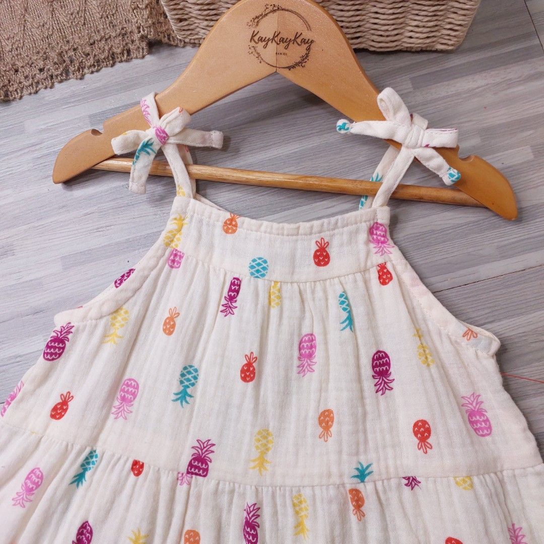 Cat & Jack 3T Pineapple Print Dress (Category: Babies & Kids Fashion) located in Subic. Submitted by kukay0521 (Listing ID 1470263379, Image 2). Description: - Brand: Cat & Jack - Size: 3T - Condition: Brand new with tag attached - Design: Cream background with colorful all-over pineapple pattern, tiered skirt, and cute tie straps at the shoulders - Measurements: ~53cm length x 30cm width - Price: PHP 450.