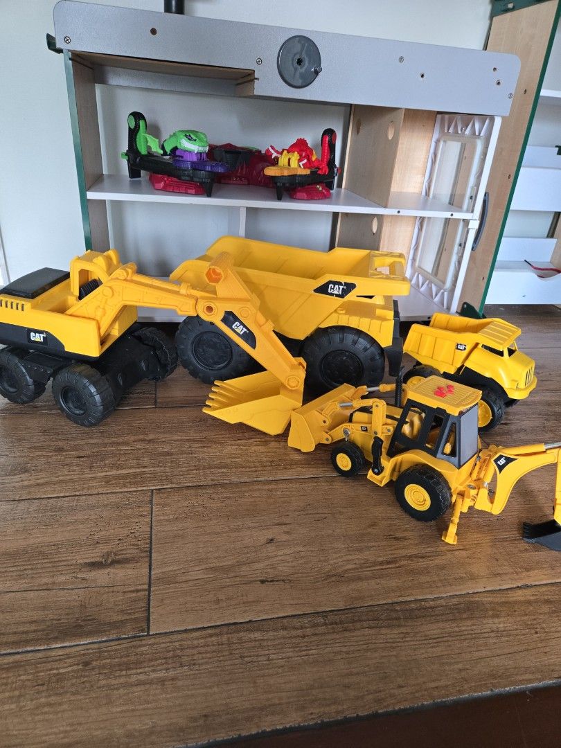 CAT Construction Toy Set Dump Truck Excavator Loader (Category: Kids Toys) located in Pasig City. Submitted by izzy0202 (Listing ID 1470146128, Image 1). Description: - Set of 3 authentic CAT construction toys: large dump truck, front loader, and small dump truck - Features real working parts and durable, chunky rubber wheels - Rugged Caterpillar build quality designed for heavy-duty play - Versatile for both indoor and outdoor sandbox adventures