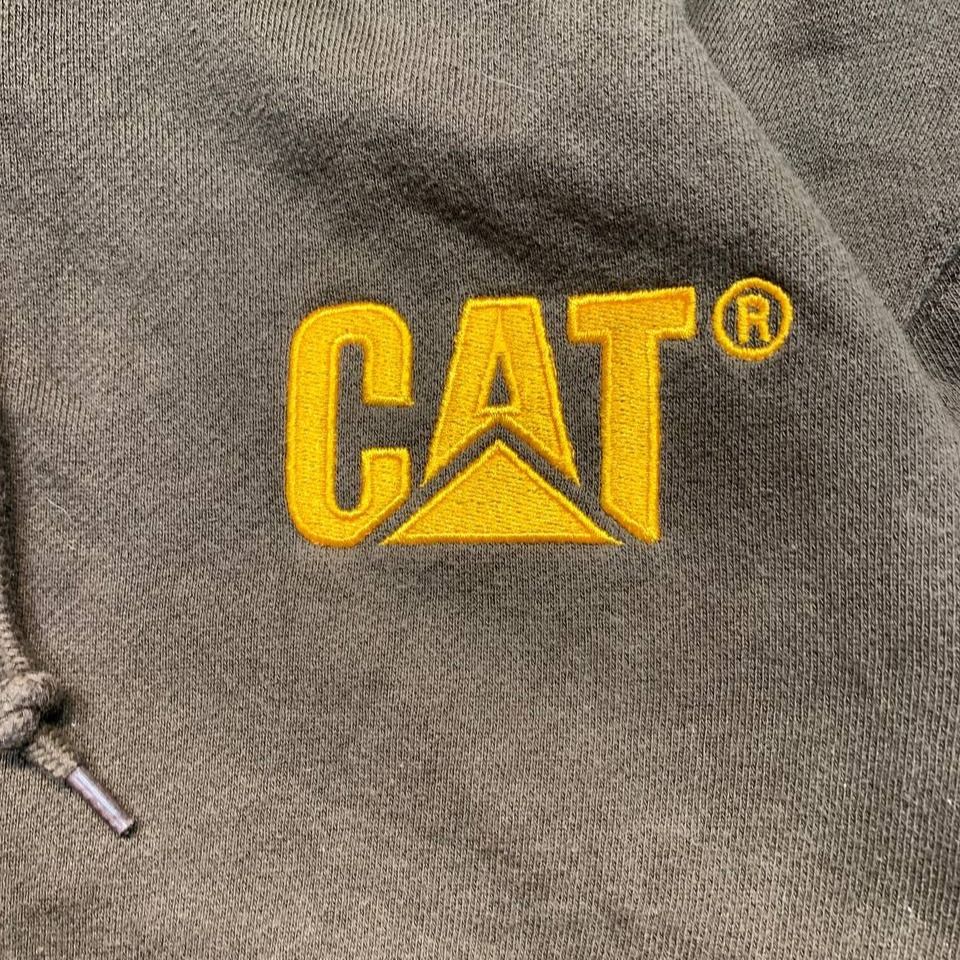 Caterpillar CAT Brown Hoodie (Category: Hoodies) located in Mandaluyong City. Submitted by theroom501 (Listing ID 1470323508, Image 3). Description: Caterpillar CAT Brown Hoodie Style Code: None Size on Tag: Large Color: Brown Condition: Good pre-owned condition with a heavily distressed vintage look. Authenticity Flaws/Issues: Visible bleach stains on the fabric. Flat Lay Measurements: Pit to Pit: 27 inches Length: 26 inches Leeg opening Length: