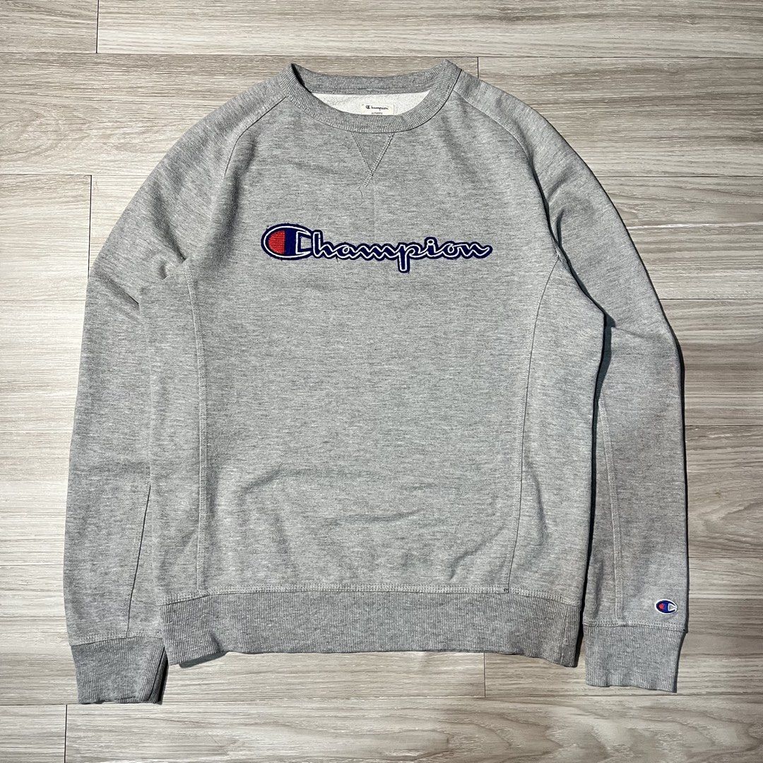 Champion Script Sweatshirt (Category: Coats, Jackets and Outerwear) located in Cavite. Submitted by latteroption (Listing ID 1470332178, Image 1). Description: Champion Script Sweatshirt issue: None Condition: 10/10 Size: M-L Length x Width: 27x22.
