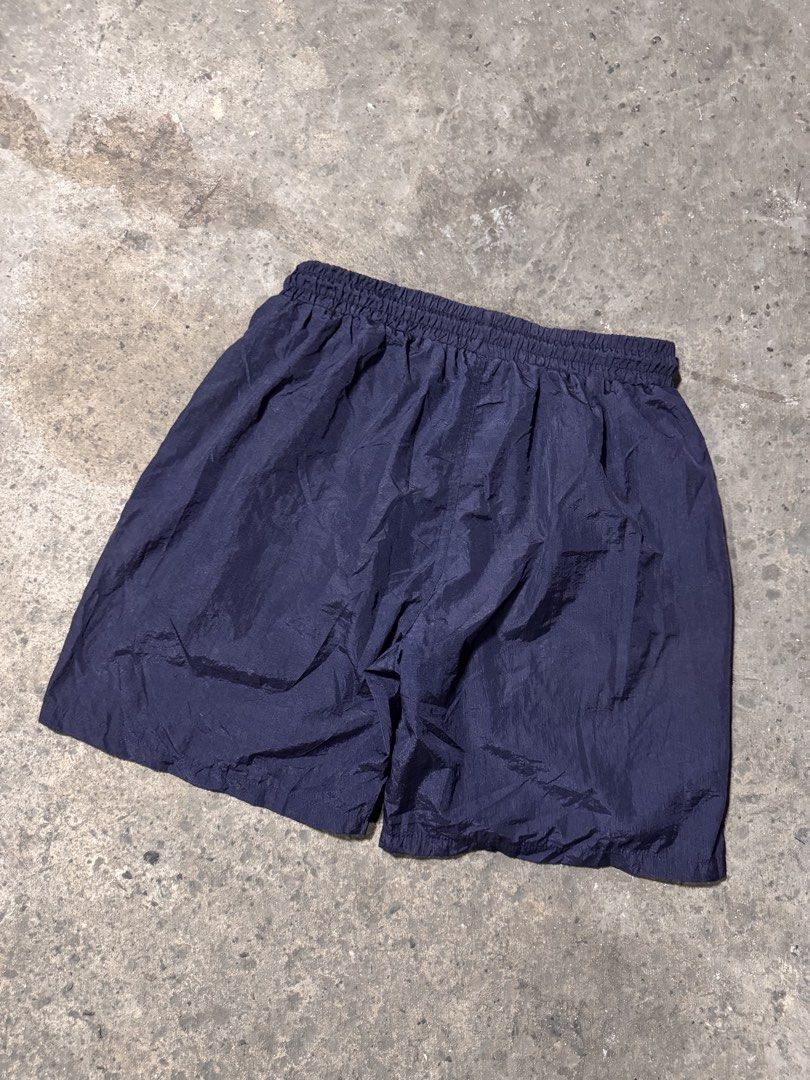 Champions nylon short (Category: Shorts) located in Pasig City. Submitted by dripthrift1600 (Listing ID 1470314568, Image 2). Description: - Champion nylon short - Good condition - Issue: None - Sizes: M - Dimes: 28x17.