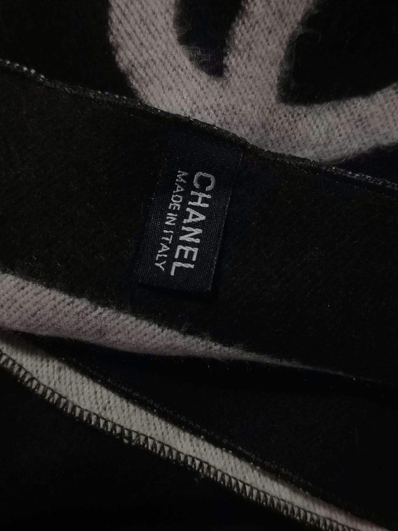 Chanel Black and Grey Logo Scarf (Category: Scarves) located in Butuan. Submitted by natalday (Listing ID 1470166048, Image 3). Description: - Authentic black and grey reversible wool scarf - Features large interlocking CC logo embroidered near each fringed end - Wide contrasting border trim design - Soft and cozy fabric texture to keep you warm during cold days - Versatile neutral colors that easily match most winter coats - Condition: Brand new