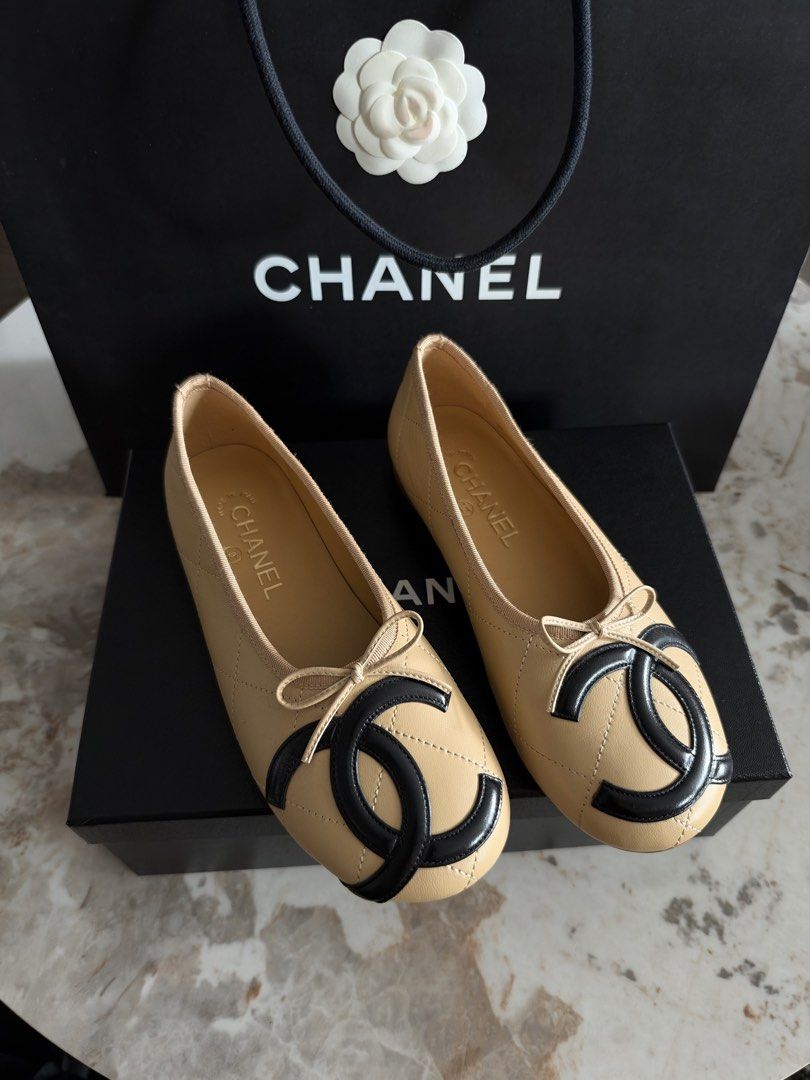 Chanel coco beach Ballet Flats (Category: Flats & Sandals) located in Manila. Submitted by luxuryelle88 (Listing ID 1470247217, Image 2). Description: Size 38 - Brand: Chanel - Style: Quilted leather ballet flats - Color: Classic beige with black contrast cap toes - Details: Large interlocking CC logo and delicate bow on the vamp - Insoles: Leather with stamped Chanel signature logo - Inclusions: Original black presentation box and branded shoppi