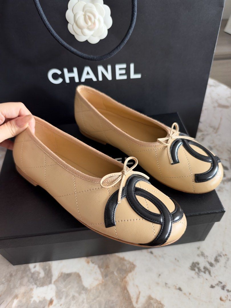 Chanel coco beach Ballet Flats (Category: Flats & Sandals) located in Manila. Submitted by luxuryelle88 (Listing ID 1470247217, Image 1). Description: Size 38 - Brand: Chanel - Style: Quilted leather ballet flats - Color: Classic beige with black contrast cap toes - Details: Large interlocking CC logo and delicate bow on the vamp - Insoles: Leather with stamped Chanel signature logo - Inclusions: Original black presentation box and branded shoppi