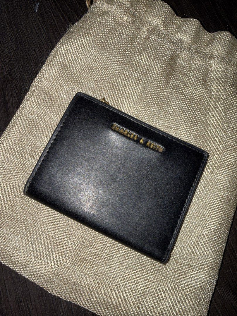 Charles & Keith Black Wallet (Category: Wallets & Card holders) located in Caloocan City. Submitted by tootsief (Listing ID 1470286871, Image 1). Description: .