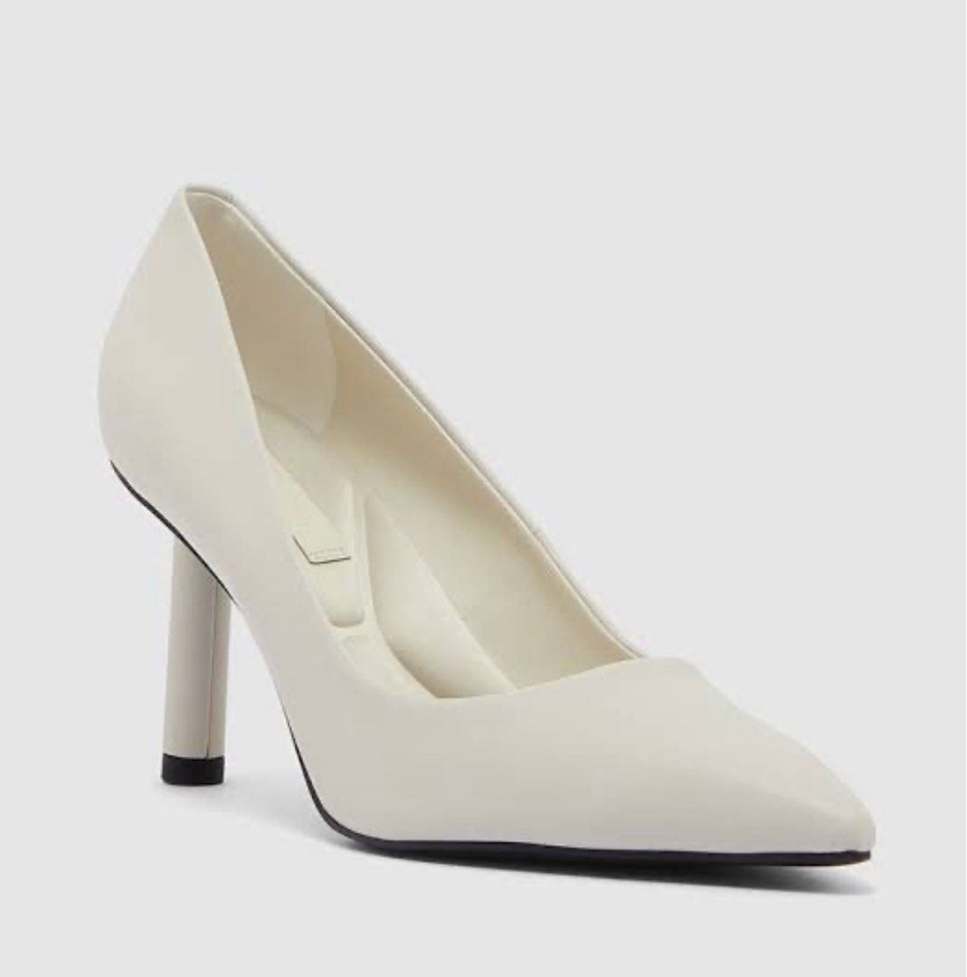 Charles & Keith: Chalk Elegant Pointed Heels with Gold Accent (Category: Heels) located in Paranaque City. Submitted by floramese (Listing ID 1470337042, Image 2). Description: Used a few times, but I have to stop gaslighting myself that it’s my size when it’s too big talaga 😆 Original price is around 3k. ✿ SO chic! would keep sana ): ✿ minor scratch only, almost good as new ✿ perfect for all occasions ✿ white/cream color.