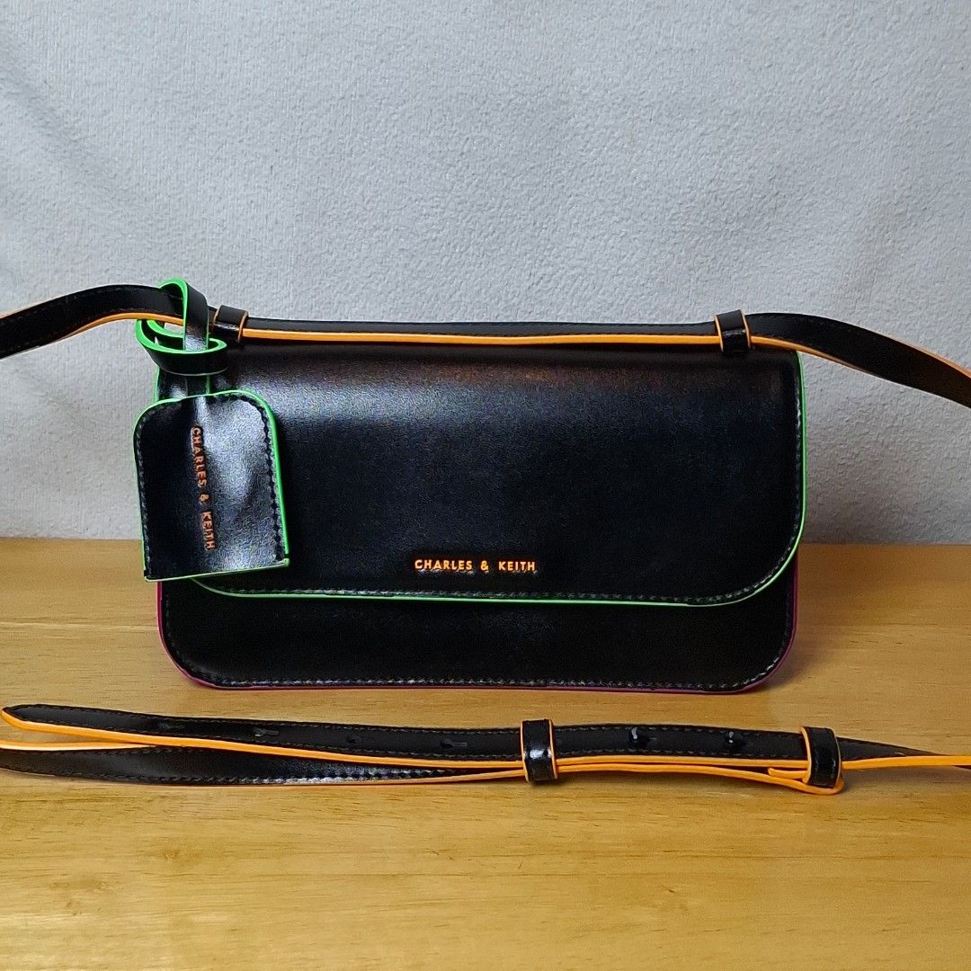Charles & Keith Clove Crossbody Bag (Category: Cross-body Bags) located in Baguio. Submitted by kathuu27 (Listing ID 1470215209, Image 1). Description: Charles & Keith Clove Crossbody Bag 2way ( Sling / Shoulder Bag) 21 x 9 x 10cm Baguio City Based (open for dropping/meet-up) Outside Baguio - Payment First Shipping +SF Courier: Jnt.