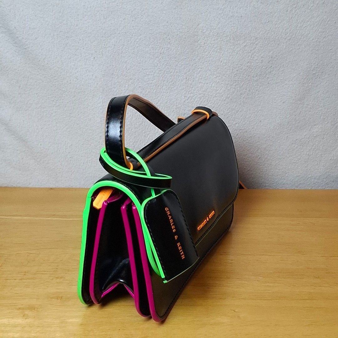Charles & Keith Clove Crossbody Bag (Category: Cross-body Bags) located in Baguio. Submitted by kathuu27 (Listing ID 1470215209, Image 3). Description: Charles & Keith Clove Crossbody Bag 2way ( Sling / Shoulder Bag) 21 x 9 x 10cm Baguio City Based (open for dropping/meet-up) Outside Baguio - Payment First Shipping +SF Courier: Jnt.