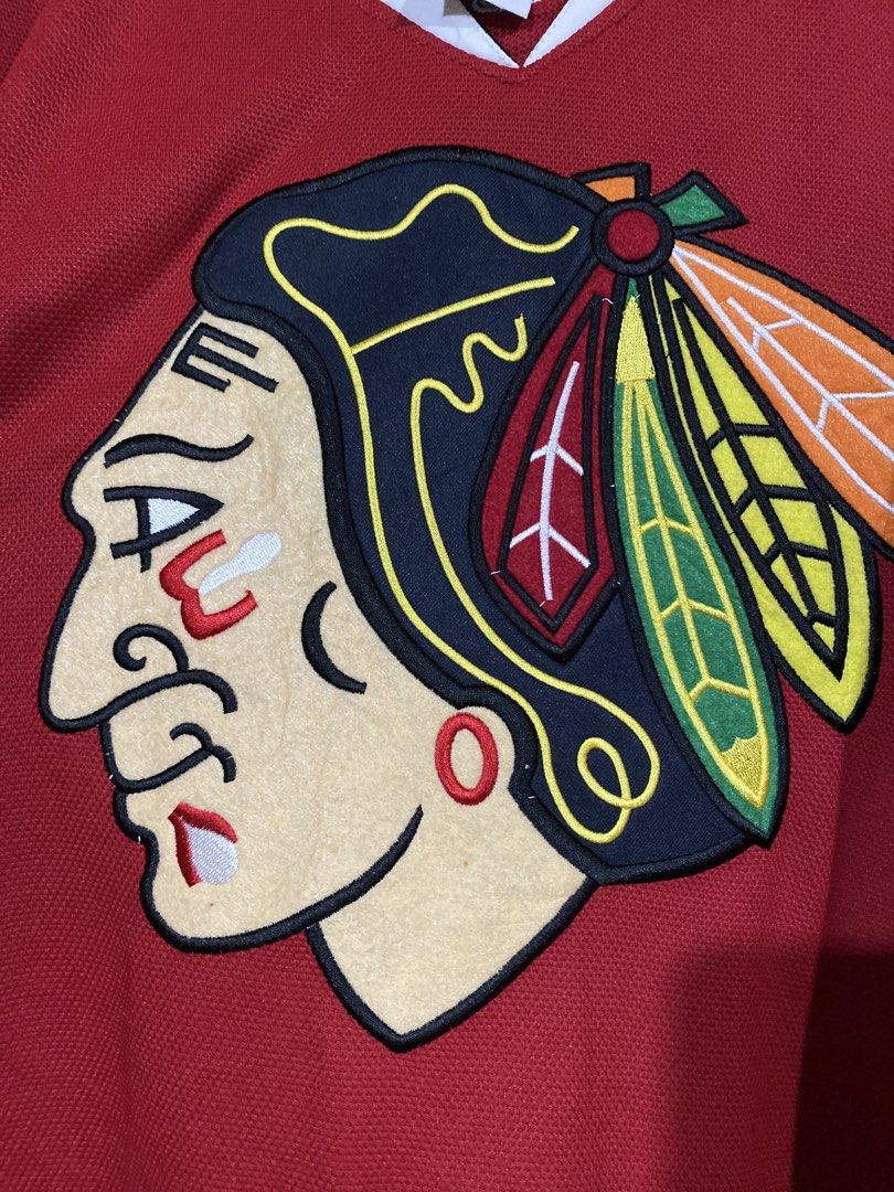 Chicago Blackhawks Patrick Kane Reebok CCM Jersey Size 50 (Category: Activewear) located in Caloocan City. Submitted by camarcenin42067 (Listing ID 1470280410, Image 3). Description: - Authentic Chicago Blackhawks hockey jersey - Player: Patrick Kane (#88 on back and sleeves) - Size: 50 (Made in Canada) - Brand: CCM with Reebok branding 24x33 - Colorway: Classic red, white, and black - Details: Large embroidered team crest on chest - Condition: C