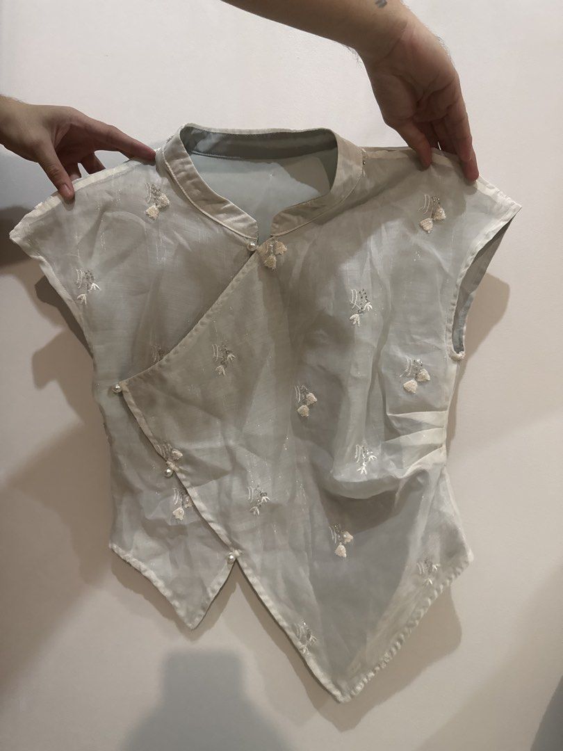 Chinese Collar Wrap Blouse with Embroidered De (Category: Blouses) located in Makati City. Submitted by banshee1411 (Listing ID 1470241175, Image 1). Description: best fit small frame.