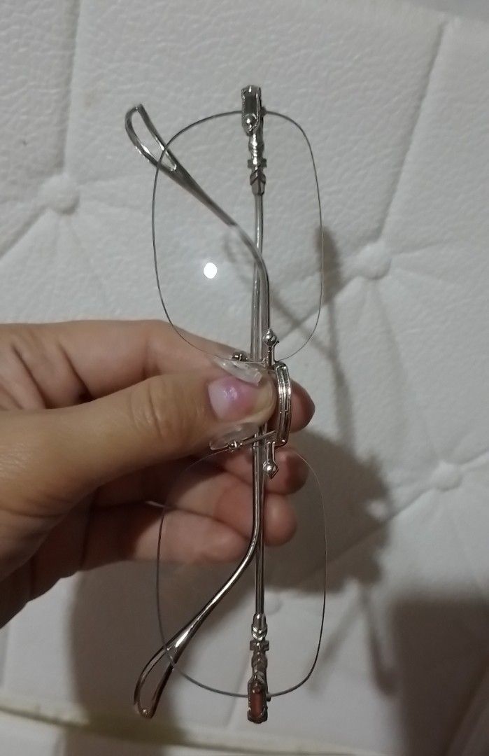 Chrome hearts inspired Rimless Eyeglasses (Category: Sunglasses & Eyewear) located in Batangas. Submitted by zenrez_shop (Listing ID 1470304577, Image 2). Description: Photochromic and anti blue light Rimless Silver frame.