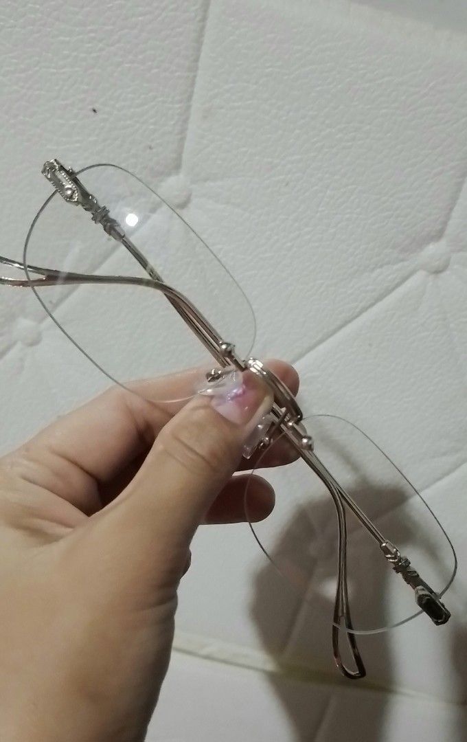 Chrome hearts inspired Rimless Eyeglasses (Category: Sunglasses & Eyewear) located in Batangas. Submitted by zenrez_shop (Listing ID 1470304577, Image 1). Description: Photochromic and anti blue light Rimless Silver frame.