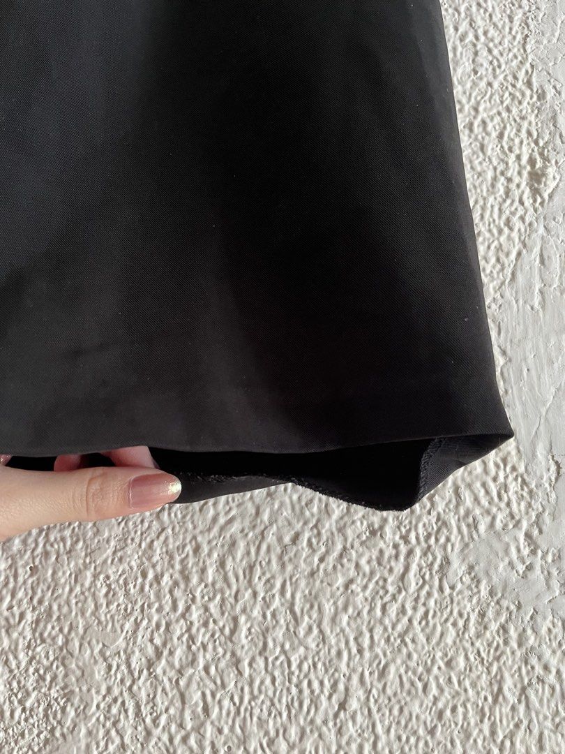 Classic Black Mini Skirt (Category: Skirts) located in Cebu City. Submitted by danabelleza (Listing ID 1470269387, Image 2). Description: - Color: Classic Black - Style: Structured mini skirt (not sewn hemline) - Closure: Standard back zip - Material: High-quality woven fabric that holds its shape well - Versatility: Neutral piece that easily matches any top in your closet.