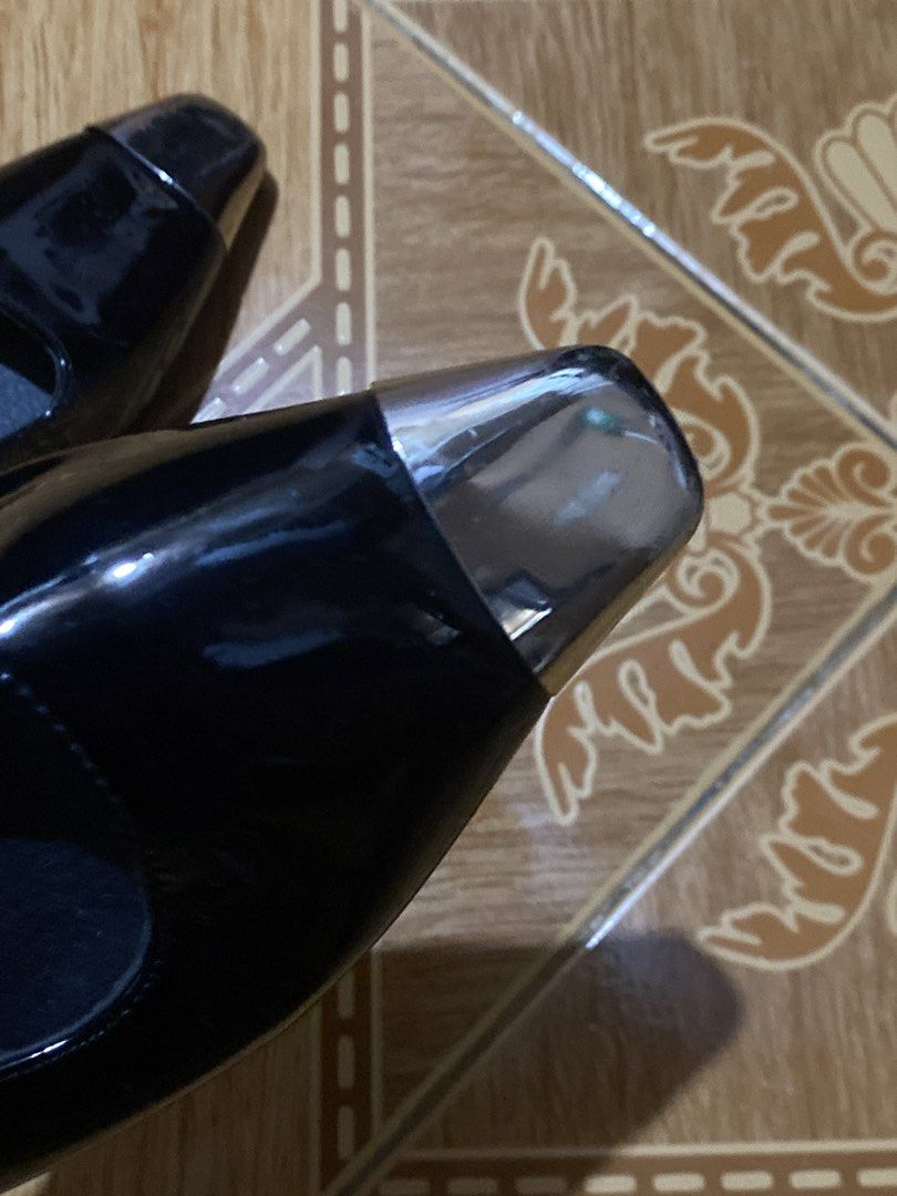 Close-Toe black heels with metal front (Category: Heels) located in Manila. Submitted by dear_soleil (Listing ID 1470226797, Image 3). Description: size 38 issues: slight rust on one of the metal front dented side .