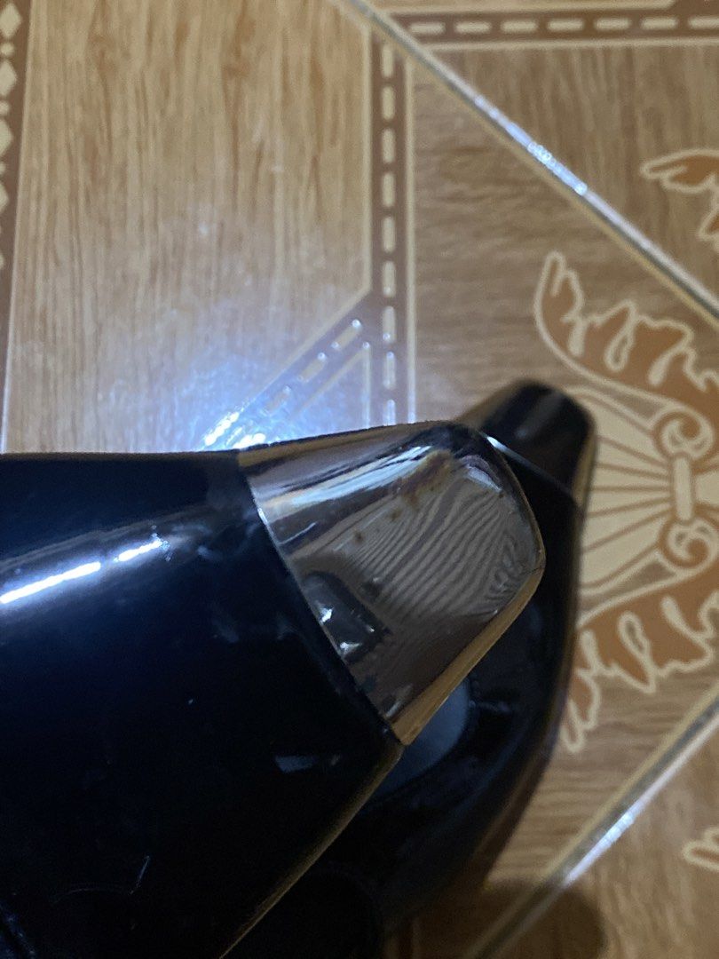 Close-Toe black heels with metal front (Category: Heels) located in Manila. Submitted by dear_soleil (Listing ID 1470226797, Image 2). Description: size 38 issues: slight rust on one of the metal front dented side .