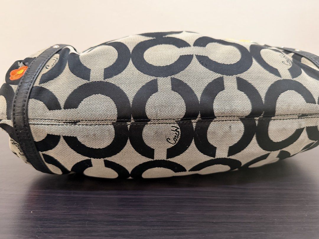 Coach Alexandra op art shoulder bag (Category: Shoulder Bags) located in Davao. Submitted by kayax09 (Listing ID 1470168990, Image 3). Description: Well used bag. Some rubs on its canvas. Iron patches applied. .