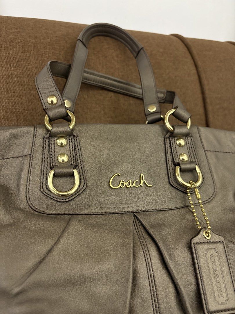 Coach Ashley Leather Satchel in Bronze (Category: Shoulder Bags) located in Manila. Submitted by k_urieee (Listing ID 1470254804, Image 2). Description: Guaranteed Authentic - Pre-loved - Rank SA/A - Condition: 10/10 - No major issues (send me a DM for more detailed pictures of the item) - Clean interior & exterior of the bag - Intact rubber lining - No tarnish in hardwares, still in excellent condition - All items are preloved. Please manage you