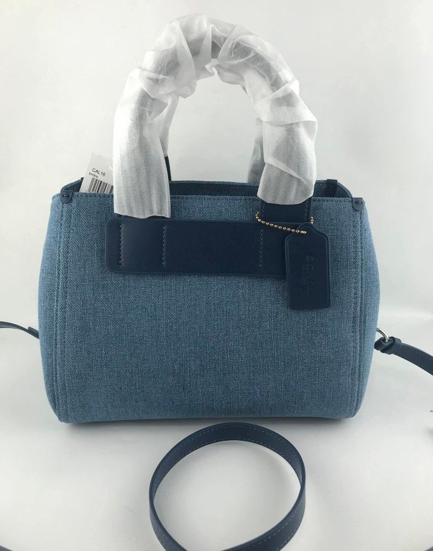 Coach Carly Carryall in Denim (Category: Cross-body Bags) located in Quezon City. Submitted by bagsboutiqueph (Listing ID 1470158441, Image 3). Description: LAST PRICE POSTED. LIMITED STOCKS! BRANDNEW WITH INCLUSIONS. COLOR MAY SLIGHTLY VARY IN ACTUAL DUE TO LIGHTING AND CAMERA SETTING. OTHER PHOTOS WILL BE SEND DURING PURCHASE AND FOR SURE BUYERS ONLY. WHEN IN DOUBT, DO NOT ORDER. THANK YOU..