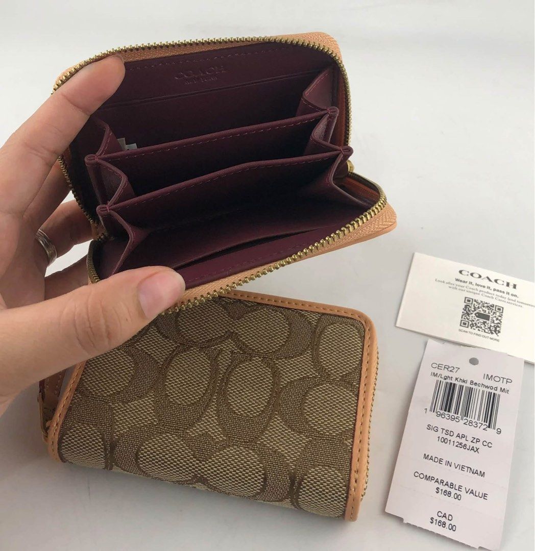 Coach Essential Small Zip Around Case in Signature Canvas (Category: Wallets & Card holders) located in Binan City. Submitted by pinkykeenshop (Listing ID 1470346560, Image 2). Description: .