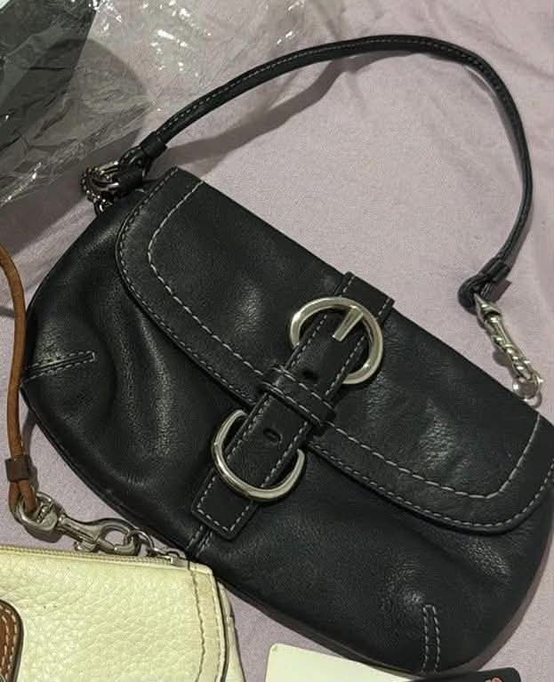 Coach Flap Wristlet (Category: Luxury Bags & Wallets) located in Manila. Submitted by bln.preloved (Listing ID 1470246360, Image 1). Description: - rare item - good condition - goes for $98+ sa US .