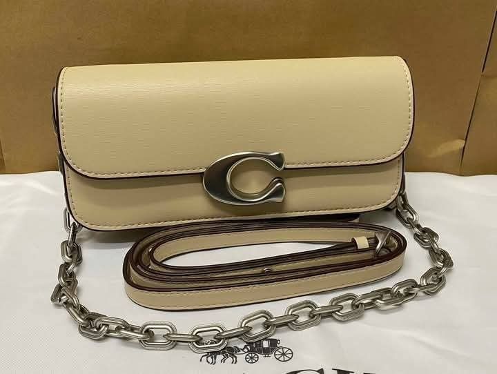 Coach Idol Small Crossbody (Category: Cross-body Bags) located in Quezon City. Submitted by bagsboutiqueph (Listing ID 1470143702, Image 2). Description: LAST PRICE POSTED. LIMITED STOCKS! BRANDNEW WITH INCLUSIONS. COLOR MAY SLIGHTLY VARY IN ACTUAL DUE TO LIGHTING AND CAMERA SETTING. OTHER PHOTOS WILL BE SEND DURING PURCHASE AND FOR SURE BUYERS ONLY. WHEN IN DOUBT, DO NOT ORDER. THANK YOU..