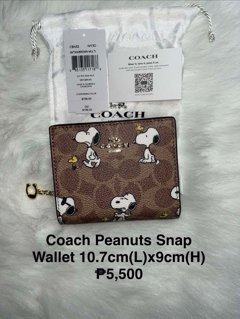 Coach Limited-edition Peanuts Snoopy Snap Wallet Brown Multi (Category: Wallets & Card holders) located in Imus. Submitted by maria_pilayo (Listing ID 1470345423, Image 1). Description: - 💯% Authentic Coach Peanuts Collection Snap Wallet - Material: Signature PVC with Snoopy & Woodstock print - Interior: Brown leather with snap closure - Features: ID window, card slots, and zip coin pocket - Dimensions: Approx. 10.7cm x 9cm - Inclusions: Origina