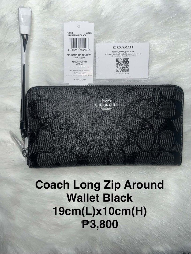 Coach Long Zip Around Wallet Black C4452 (Category: Wallets & Card holders) located in Imus. Submitted by maria_pilayo (Listing ID 1470227477, Image 1). Description: - 💯% Authentic Coach Long Zip Around Wallet - Charcoal and black signature coated canvas - Measures 19cm x 10cm - Includes detachable wrist strap, original tags, and care card - Features multiple card slots and a secure zippered coin compartment - All-around zip closure for safety.