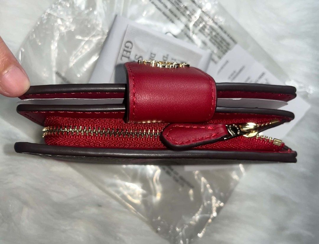 Coach Medium Corner Zip Signature Cherry Wallet IM/TAN MULTI (Category: Wallets & Card holders) located in Imus. Submitted by maria_pilayo (Listing ID 1470276385, Image 2). Description: - Coach - Brand new, never used, and stored in plastic packaging - 💯% Authentic Coach medium corner zip wallet in signature canvas with cherry print - Features rich red leather trim and gold-tone hardware - Compact size: 13cm x 9cm - Interior includes multiple ca