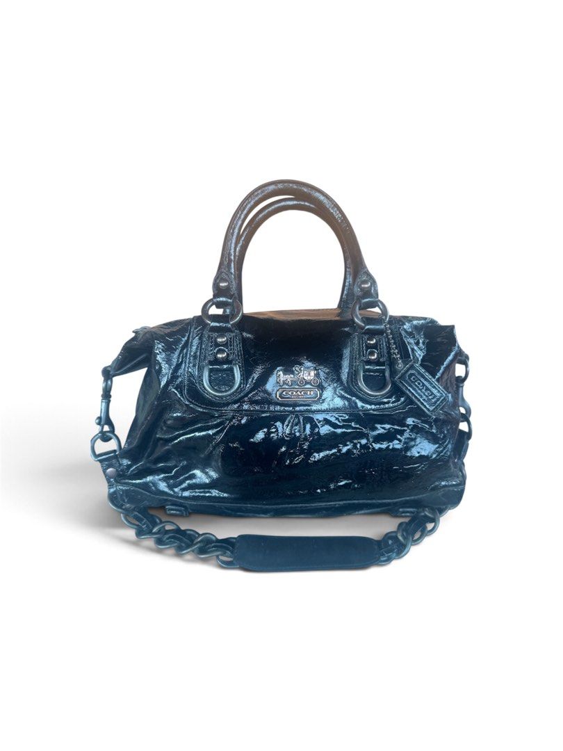 Coach Patent Leather Black Shoulder Bag with Chain Strap (Category: Luxury Bags & Wallets) located in Lingayen. Submitted by lux_thrift (Listing ID 1470144752, Image 2). Description: location pangasinan im not very sure about the exact model patent leather not faded creed already flaked no inclusion black color needs cleaning.