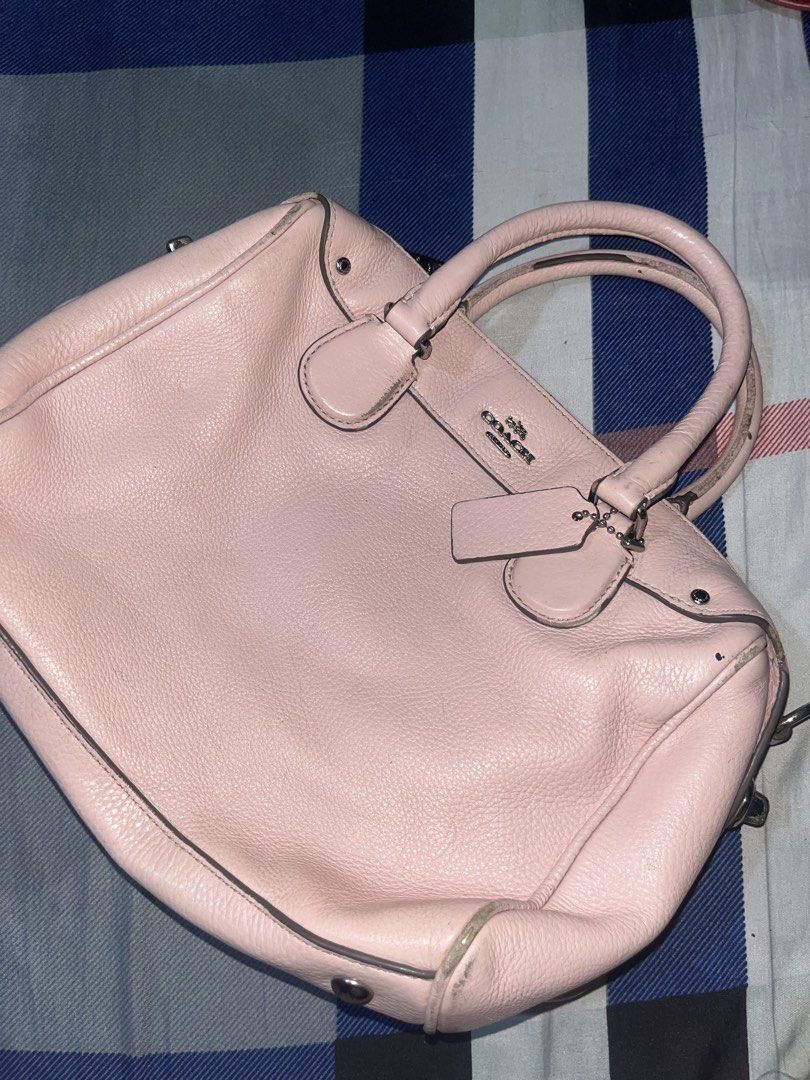 Coach Pink Leather Handbag Satchel (Category: Luxury Bags & Wallets) located in Manila. Submitted by nagbebentabumibili (Listing ID 1470336137, Image 2). Description: - Authentic Coach handbag in soft pink pebbled leather - Silver-tone hardware with matching Coach hangtag - Secure zip closure with double top handles - Pink fabric-lined interior featuring a zip pocket and slip pocket - Includes official Coach creed patch inside - Flaws: Minor scuf