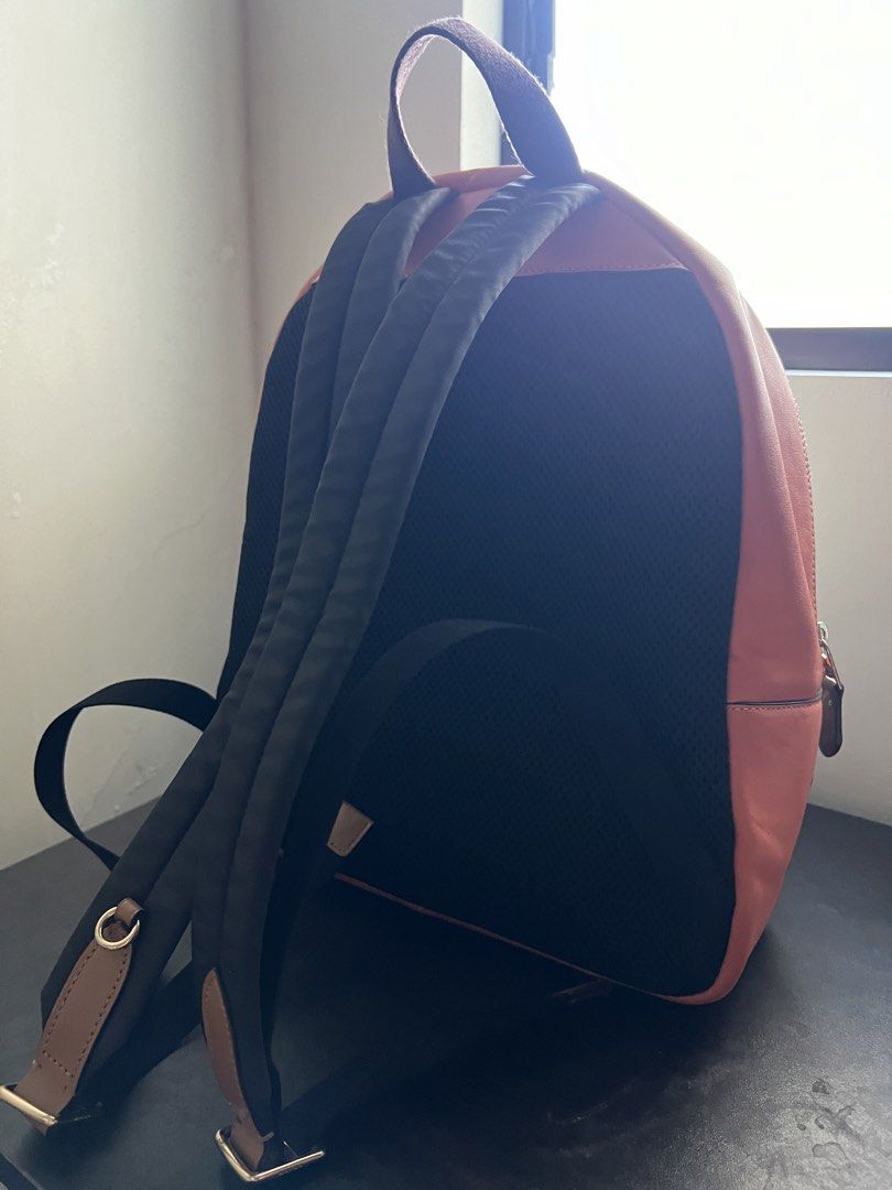 Coach Rainbow Signature Canvas Backpack (Category: Backpacks) located in Manila. Submitted by mrgixy (Listing ID 1470206681, Image 3). Description: COACH Rainbow Signature Canvas Backpack Selling Price: ₱4,500 (negotiable) Coach Style: F72846 Signature Canvas with Rainbow Motif Beige/Kahki with Coral Pink Details Condition: Like New No Peeling, stains, discoloration, or zipper issues Inclusion: Bag Only No receipt, dust bag, or original tags RFS: