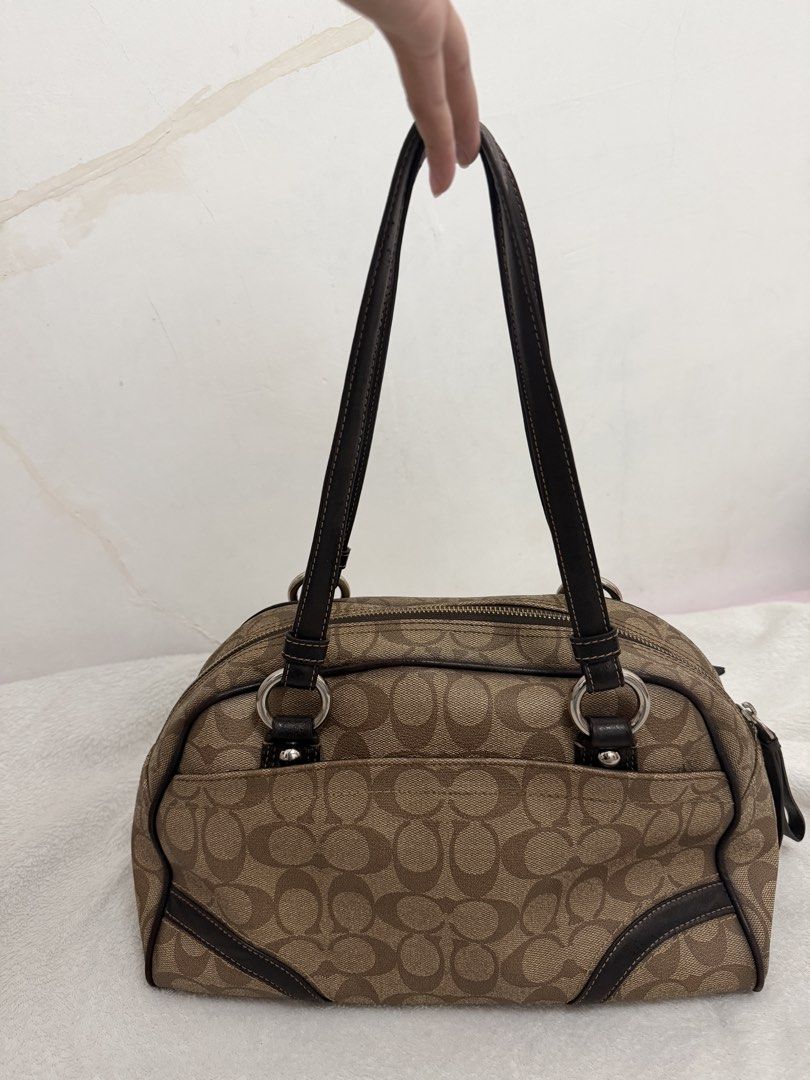 Coach Signature Satchel Handbag (Category: Luxury Bags & Wallets) located in Dasmarinas. Submitted by charoaso (Listing ID 1470173935, Image 3). Description: Coach Signature monogram shoulder bag - Color: Brown fabric with dark brown leather trim - Hardware: Silver-tone issue: lining rfs: for vet expense .