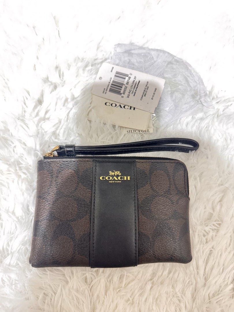 Coach Wrislet (Category: Luxury Bags & Wallets) located in Pasay City. Submitted by kiwimango03 (Listing ID 1470249927, Image 1). Description: Authentic Coach Brown/Black Wristlet Signature coated canvas What you see is what you get .