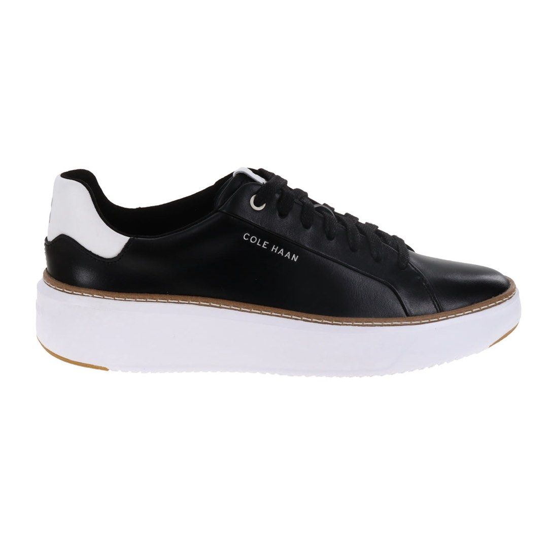Cole Haan GrandPrø topspin Platform (Category: Sneakers) located in Dasmarinas. Submitted by berrylove_preloved (Listing ID 1470271385, Image 3). Description: Size 7.5 us Nox box - Brand: Cole Haan - Color: Black and White - Style: Low-top lace-up sneakers with chunky white platform soles and brown rubber outsole - Details: Brand name on side and heel, embroidered CH logo on white heel tab, and contrast stitching along midsole - Condition: Excell