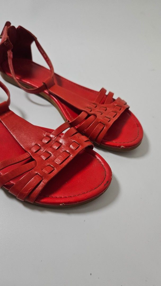 Cole Haan Red Leather Flat Sandals Size 6.5B (Category: Flats & Sandals) located in Alfonso. Submitted by jbcamet (Listing ID 1470267467, Image 3). Description: - Brand/Model: Cole Haan Leather Sandals - Color: Vibrant Red (Great for summer!) - Size: 6.5B - Material: Leather with woven strap design - Closure: Back heel zipper for easy wear - Origin: Made in India - Condition: Uppers are in clean shape; soles show light scuffing from previous wear