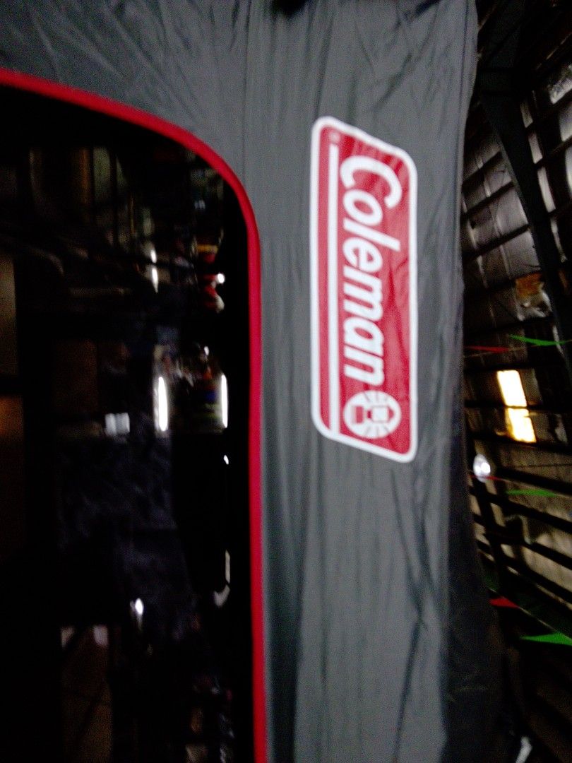 Coleman Gazebo with Integrated Lighting & 4-Sided Meshwalls (Category: Outdoor Furniture) located in Manila. Submitted by kamanowkhmr (Listing ID 1470172569, Image 3). Description: - Coleman gazebo on display, featuring a stylish grey canopy with red trim - Built-in integrated lighting system for convenient nighttime use - Four-sided mesh walls to keep bugs out while allowing a cool breeze in - Spacious interior layout ideal for outdoor gathering