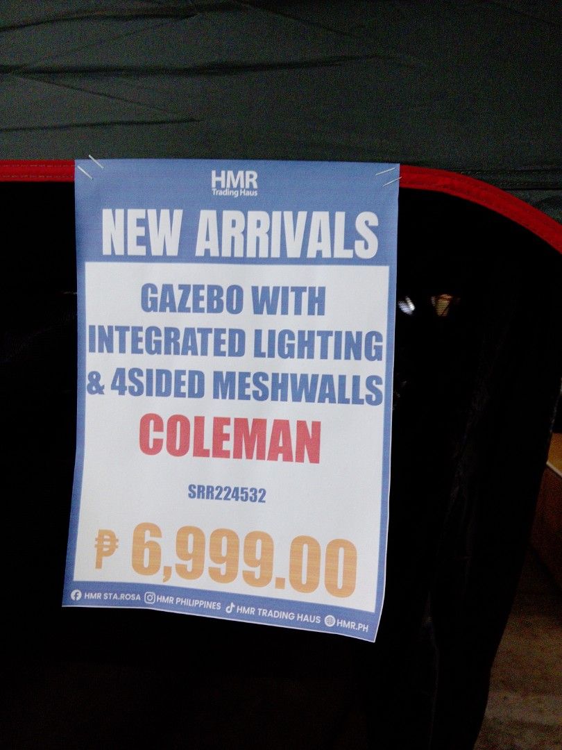Coleman Gazebo with Integrated Lighting & 4-Sided Meshwalls (Category: Outdoor Furniture) located in Manila. Submitted by kamanowkhmr (Listing ID 1470172569, Image 2). Description: - Coleman gazebo on display, featuring a stylish grey canopy with red trim - Built-in integrated lighting system for convenient nighttime use - Four-sided mesh walls to keep bugs out while allowing a cool breeze in - Spacious interior layout ideal for outdoor gathering