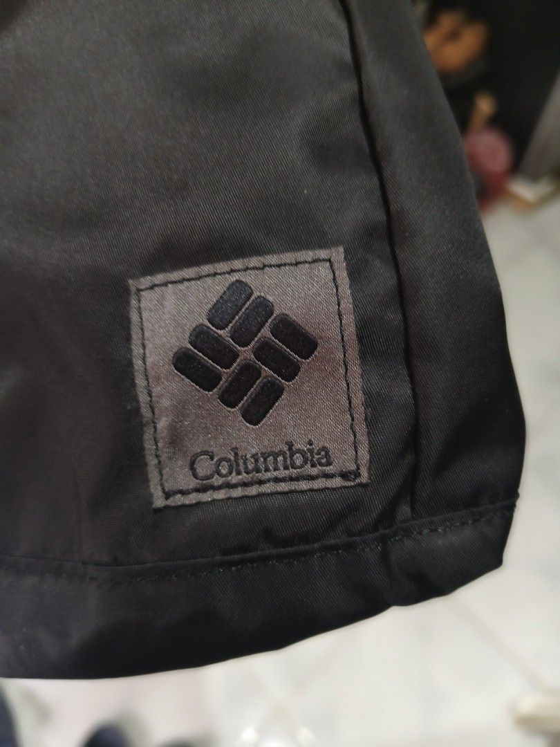 Columbia PU8732 Black Sling Bag (Category: Sling Bags) located in Sariaya. Submitted by queen_1213 (Listing ID 1470171298, Image 2). Description: - Brand: Columbia - Model: PU8732 (Made in Vietnam) - Color: Black with stylish light blue interior lining - Comfort: Single adjustable strap with breathable mesh backing and D-ring attachment - Pockets: Front zipper pocket with patterned cord pull plus an interior security zip pocket - Details: Subtle 