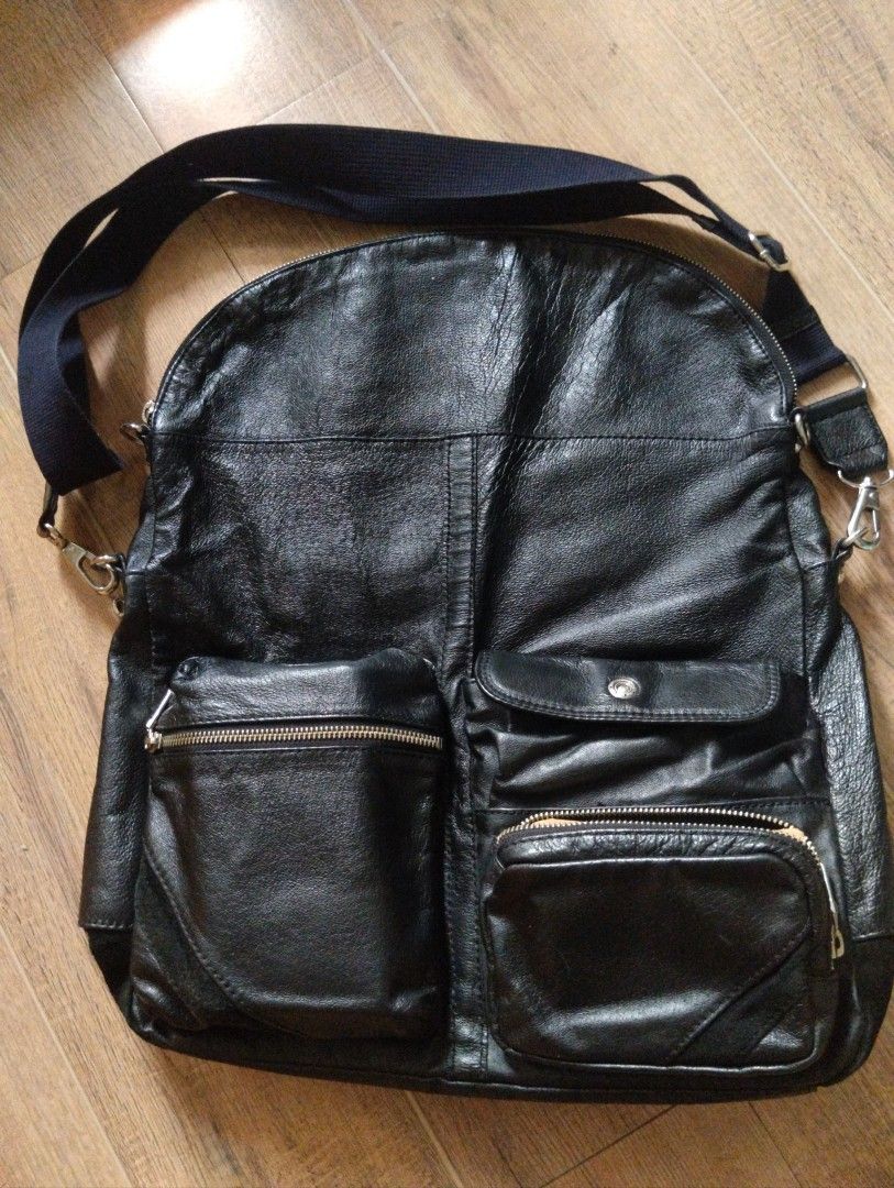 COMME CA MEN Leather Multi-Pocket Messenger Bag with Shoulder Strap (Category: Sling Bags) located in Quezon City. Submitted by rackreviva27782 (Listing ID 1470205136, Image 3). Description: COMME CA MEN LEATHER UTILITY MESSENGER BAG 2800 php +sf width 15 length 18 (9 folded) excellent condition qc loc - Color: Black - Material: Premium leather - Storage: Roomy main compartment, multiple front zip pockets, snap closure pouch, and interior zip poc