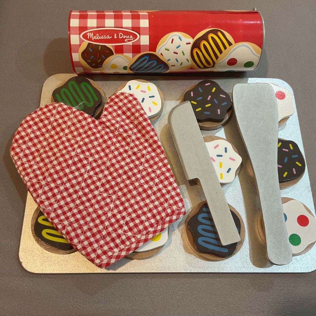 COMPLETE SET Melissa & Doug Wooden Slice and Bake Cookie Set (Category: Kids Toys) located in Caloocan City. Submitted by dubaichewyholic143 (Listing ID 1470261112, Image 2). Description: - Brand: Melissa & Doug - Item: Wooden Slice-and-Bake Cookie Play Set - Features colorful frosting designs and sprinkles - Includes 12 sliceable cookies and a metal baking sheet - Accessories included: Storage tube, oven mitt, and spatulas - Great for kids' pret
