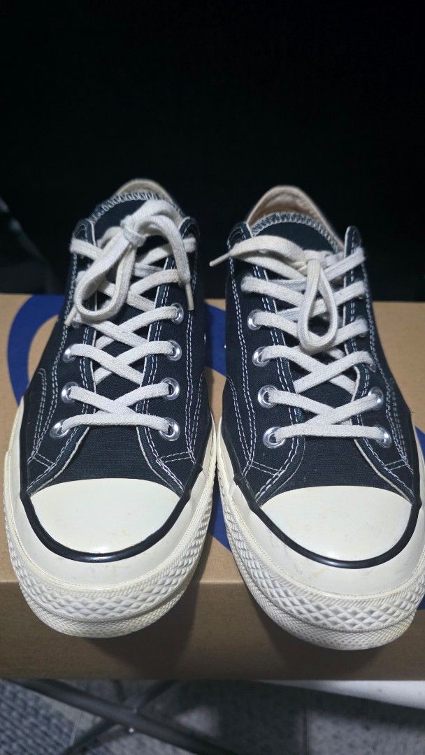 Converse Chuck 70 Low Black (Category: Casual Shoes) located in Caloocan City. Submitted by evsrs79033 (Listing ID 1470199348, Image 1). Description: - Brand: Converse - Model: Chuck 70 Low - size 8UK mens - Color: Black canvas with cream rubber midsoles and white laces - Details: Classic heel patches, black piping - Condition: 8/10 minor flaws such as sole sep, slight drags and left insole discoloration - Inclusions: Comes with original box.