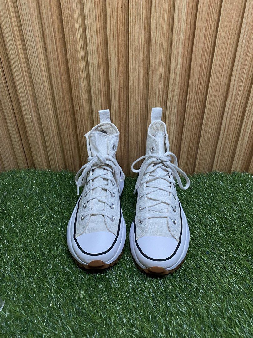 Converse Run Star Hike High Top White (Category: Sneakers) located in Butuan. Submitted by chang_14 (Listing ID 1470291652, Image 2). Description: - Brand/Model: Converse Run Star Hike - Color: Classic White Canvas - Size: US Men's 5 / US Women's 6.5 / UK 4.5 / EUR 37.5 / 23cm - Design: High-top, chunky platform sole, and iconic serrated rubber tread - Details: White laces, round toe, star logo on inner ankle, and classic star detail on heel - Co