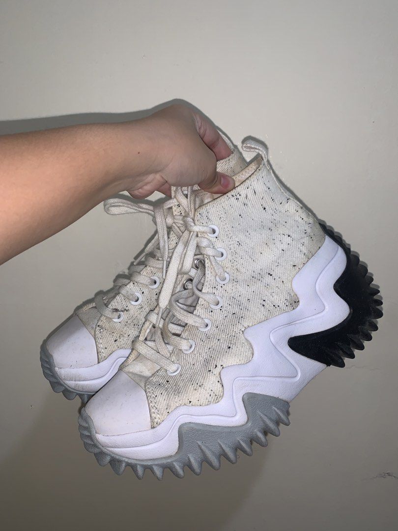Converse Run Star Motion High Top Sneakers (Category: Sneakers) located in Los Banos. Submitted by dhannielle (Listing ID 1470198948, Image 3). Description: - Brand: Converse Run Star Motion High Top - Color: Off-white with black speckle pattern - Sole: Chunky zigzag platform (white, grey, and black) with bright pink heel star detail - Closure: Standard lace-up with white laces - Condition: Worn a few times, soles show light dirt from walking - S