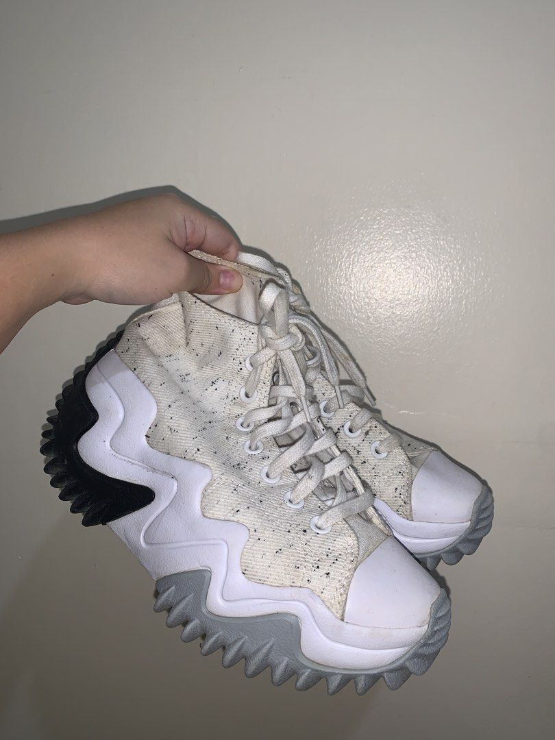 Converse Run Star Motion High Top Sneakers (Category: Sneakers) located in Los Banos. Submitted by dhannielle (Listing ID 1470198948, Image 1). Description: - Brand: Converse Run Star Motion High Top - Color: Off-white with black speckle pattern - Sole: Chunky zigzag platform (white, grey, and black) with bright pink heel star detail - Closure: Standard lace-up with white laces - Condition: Worn a few times, soles show light dirt from walking - S
